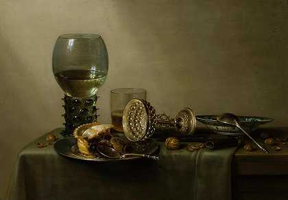 Willem Claesz Heda的《甜点，蛋糕、葡萄酒、啤酒和坚果的静物》