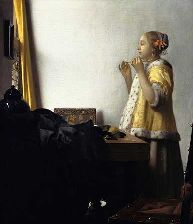 约翰内斯·维米尔的《戴珍珠项链的年轻女人》